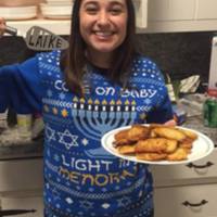 Amy Groswald making Latkes.jpg